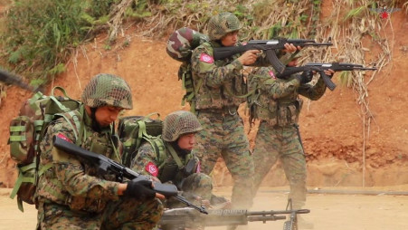 Myanmar anti-junta fighters battle military in state capital