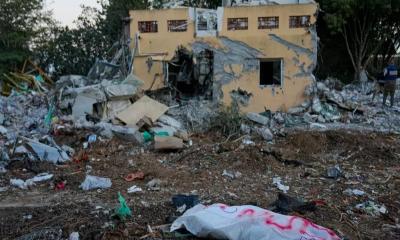 After a hard fight to clear militants, Israeli soldiers find a scene of destruction, slain children