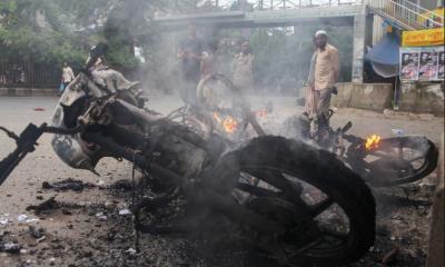 Protest around ambulance carrying Sayeedi’s body: Jamaat-Shibir activists set motorbikes on fire