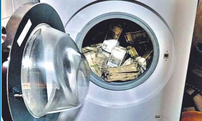 ওয়াশিং মেশিন থেকে উদ্ধার হলো কোটি কোটি টাকা!