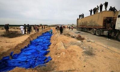 In Gaza, dozens of unidentified bodies buried in ‍‍`mass grave‍‍`