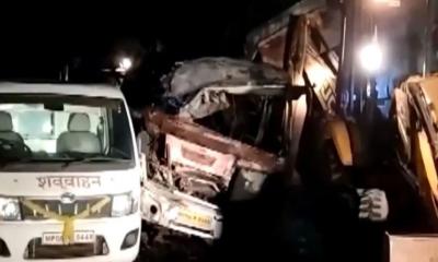 Bus collides head-on with truck in central India, killing at least 13