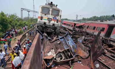 Indian authorities arrest 3 railway officials over train crash killing more than 290 people