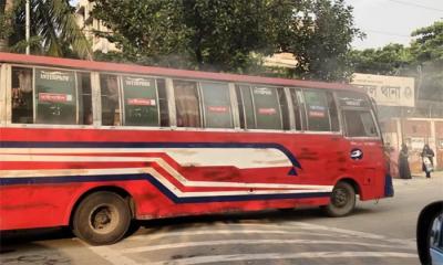 Bus torched in front of Kafrul Police Station