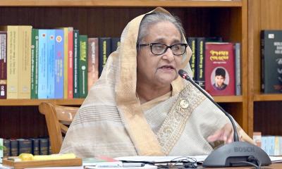 পোশাক শ্রমিকদের কাজ করতে হবে নতুন মজুরিতেই : প্রধানমন্ত্রী