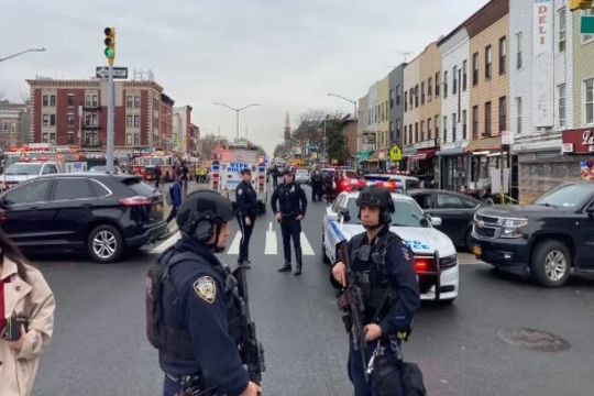 Suspect at large as Brooklyn subway shooting injures 16