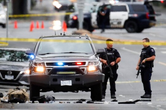 Two gunmen killed, six officers wounded in shootout at Canadian bank
