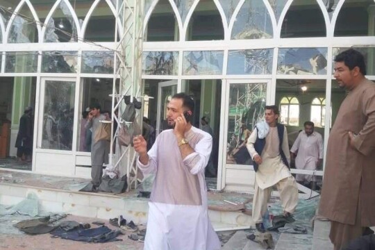 Explosion strikes Afghan mosque during prayers, at least 16 dead