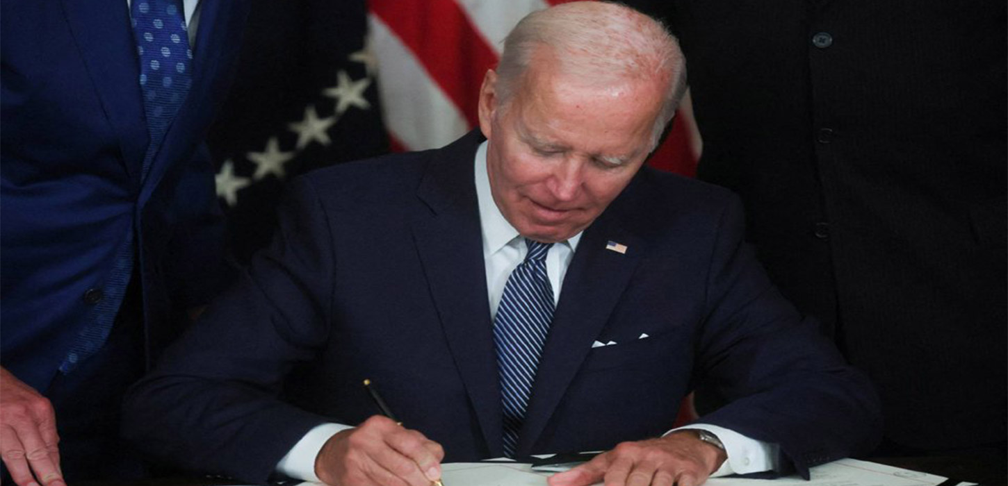 Biden signs major climate change, health care law