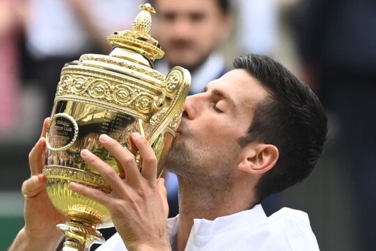 Djokovic wins Wimbledon to secure record-equalling 20th major