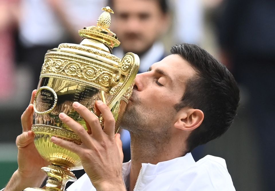 Djokovic wins Wimbledon to secure record-equalling 20th major
