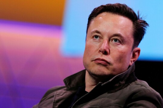 Elon Musk accuses media of racism after newspapers drop Dilbert cartoon