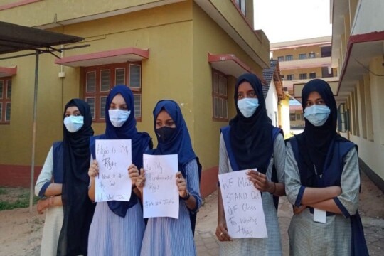 Indian state re-opens some schools after hijab dispute