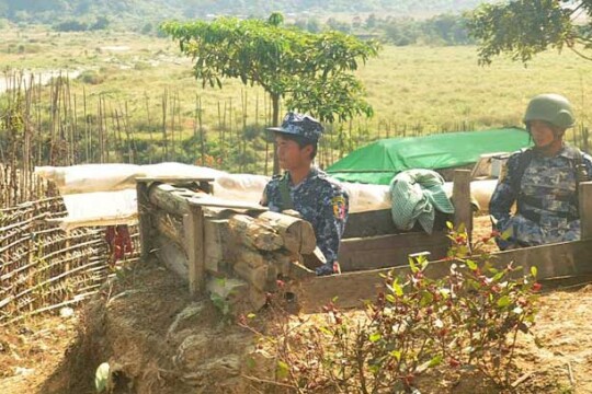 Myanmar force patrol near Bangladesh border with heavy arms