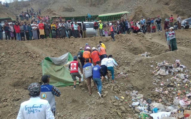 Three bodies found, but scores buried by landslide at Myanmar jade mine