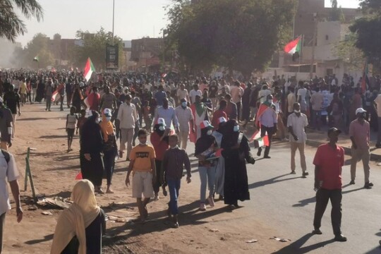 One killed in Sudan as thousands protest against military