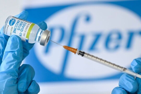 Covid booster shots will likely be needed every year, Pfizer chief says