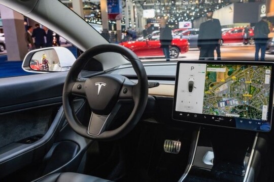Tesla disables gaming while driving feature