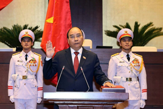 Vietnam’s pandemic response leader sworn in as president